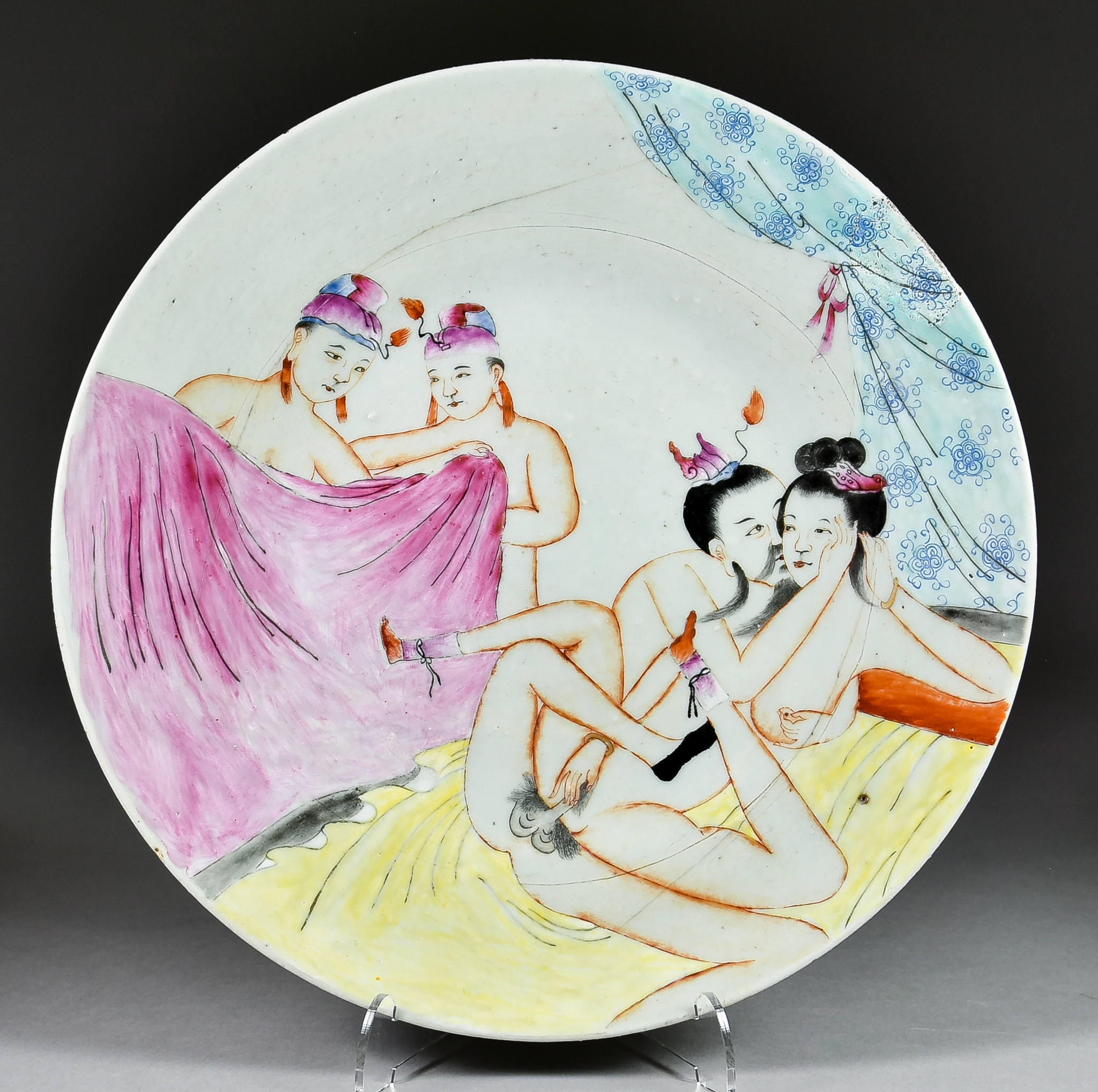 A Chinese Porcelain Circular Dish, 20th Century, enamelled in colours with an erotic scene, 12.25ins