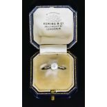 A Platinum Solitaire Diamond Ring, 20th Century, with a collet set brilliant cut white diamond,