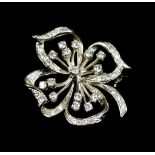 An 18ct White Gold Diamond Bow Brooch, 20th Century, set with small brilliant cut white diamonds,