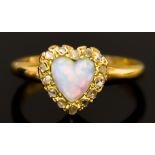 A Yellow Metal Heart Shaped Opal and Diamond Ring, 19th Century, set with a centre opal, 6mm x 6mm