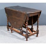 An Oak Oval Gateleg Table of 17th Century Design, on spiral turned legs, with plain stretchers, on