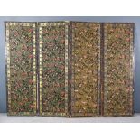 A Late 19th/ Early 20th Century "Arts and Crafts" Four Fold Draught Screen, each fold studded and