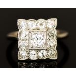 A Platinum Square Diamond Ring, 20th Century, set with thirteen brilliant cut white diamonds,