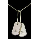 A Set of 18ct White Gold "Dog Tags", by Gucci, set with a small brilliant cut white diamond, each