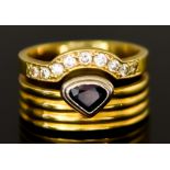 An 18ct Gold Sapphire and Diamond Ring, Modern, set with a centre sapphire, approximately .75ct,