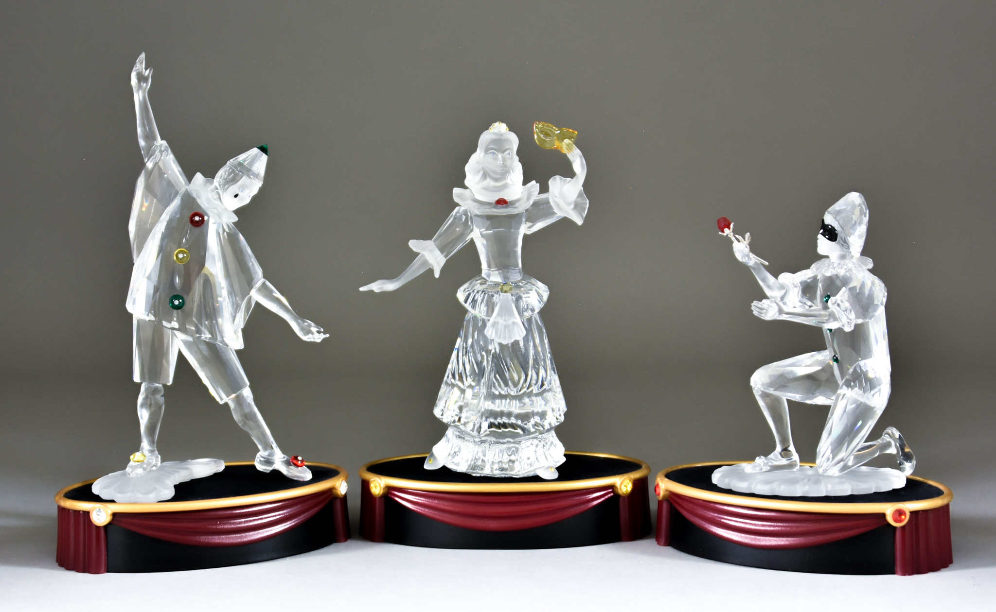 Three Swarovski Crystal Annual Editions Figures - "Pierrot", "Harlequin", and "Columbine", all