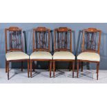 A Set of Four Edwardian Mahogany Occasional Chairs, with shaped crest rails, rectangular panels