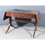 A George III Mahogany Sofa Table, with triple reeded edge to top, fitted two real and two dummy