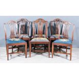 A Harlequin Set of Six Mahogany Dining Chairs of "Hepplewhite" Design, with shaped crest rails,