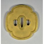 A Japanese Tsuba, Sentoku, Mokko-gata, with gilt rim and seppa-dai, Edo period (1615-1868) 3.5ins