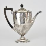 A Late Victorian Silver Oval Coffee Pot by Mappin Brothers, Sheffield 1898, with part reeded body,