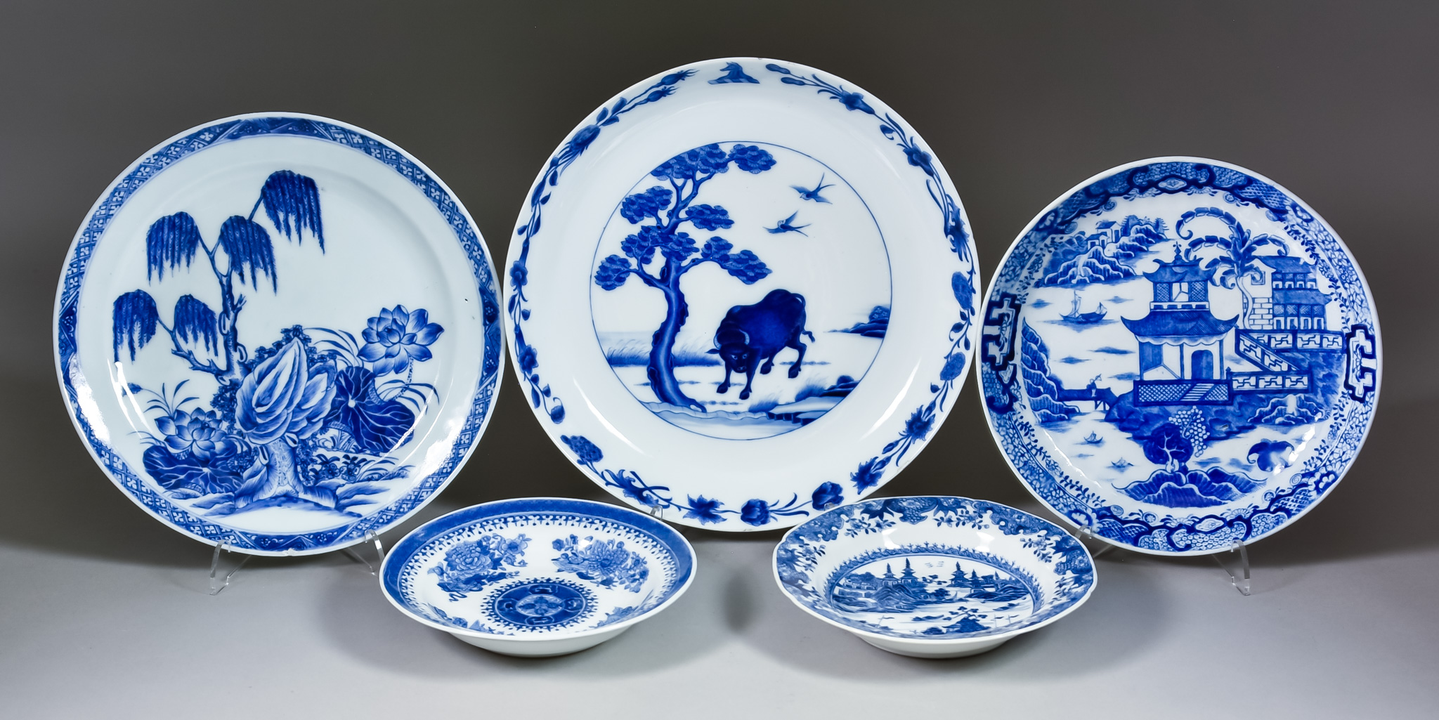 A Chinese Blue and White Porcelain Plate, 19th Century, painted with a landscape with a bull by a