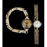 A Lady's Manual Wind Wristwatch, by Omega, 9ct gold case, 18mm diameter, silver dial with gold baton