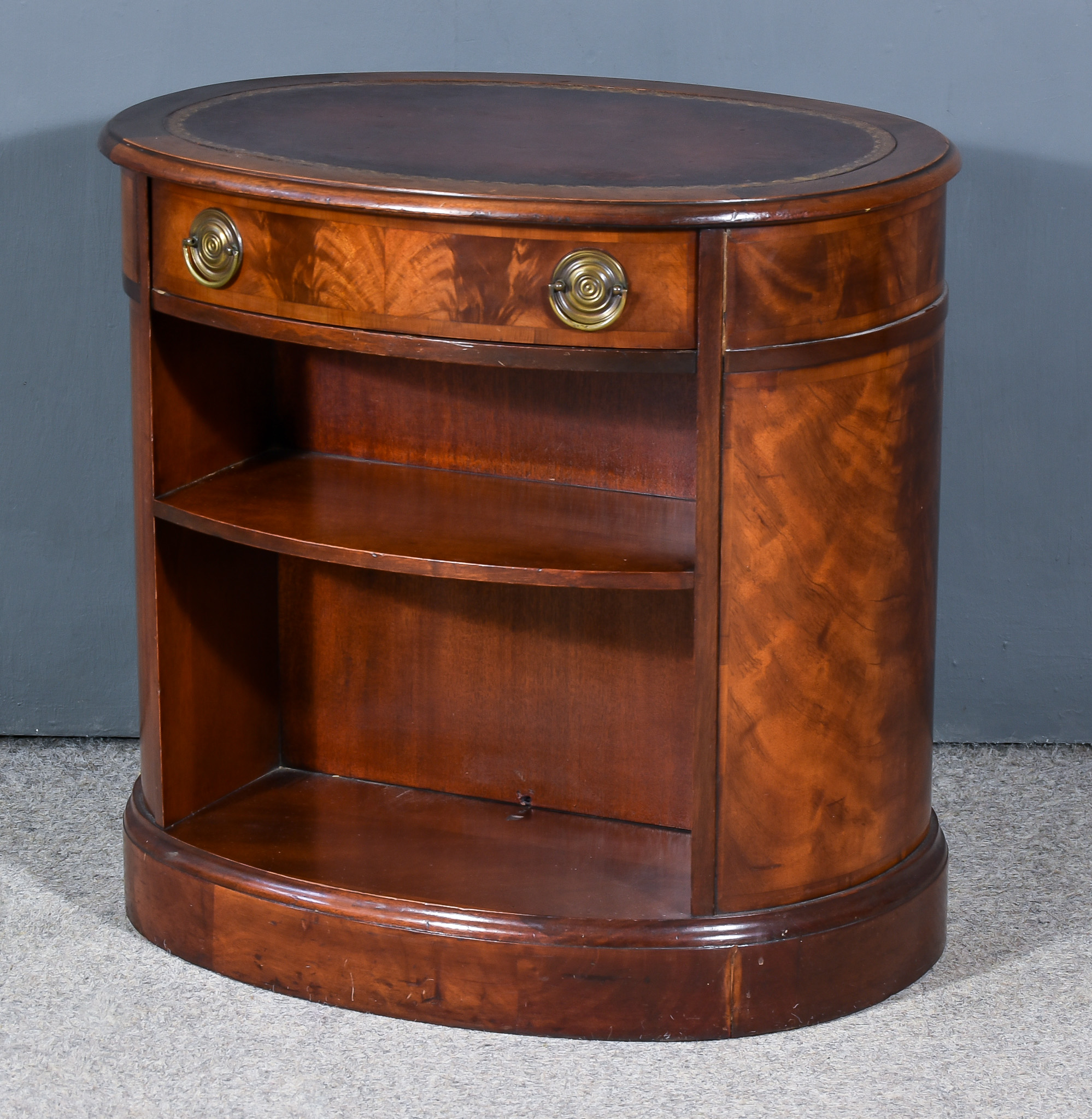 A Modern Mahogany Oval Lamp table of Georgian Design, with leather inset to top, fitted one frieze