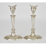 A Pair of Elizabeth II Silver Oval Candlesticks of Neo Classical Design by Adie Brothers Ltd.,
