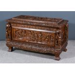 A Modern Near Eastern Indian Hardwood Storage Chest, with raised edge to top, the whole carved