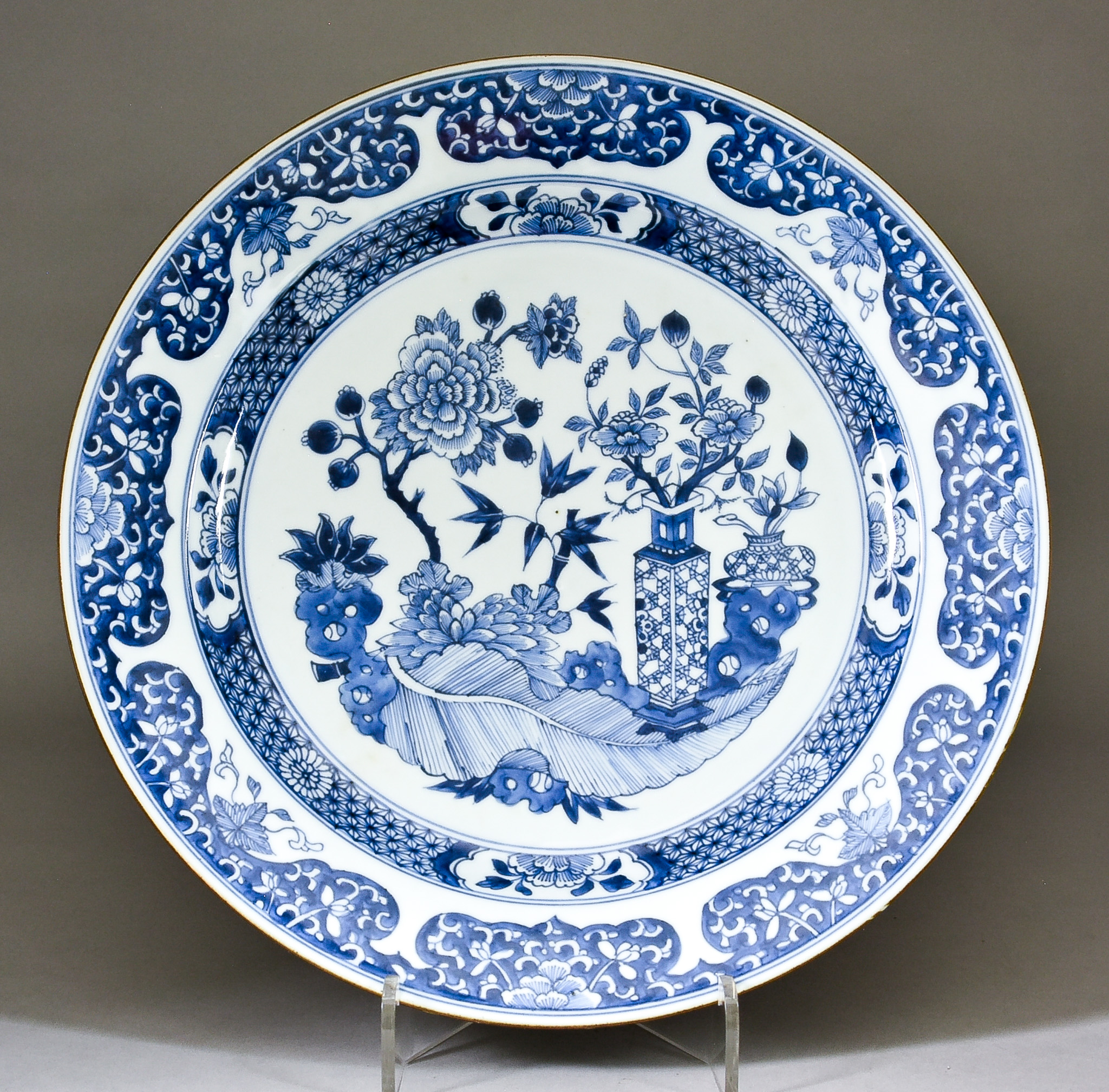 A Chinese Blue and White Porcelain Charger, Qianlong Period, painted with two vases of flowers,