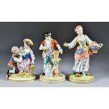 A Berlin Porcelain Group, Late 19th/Early 20th Century, and Two Dresden Porcelain Figures, 20th