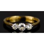 An 18ct Gold Three Stone Diamond Ring, 20th Century, set with three small brilliant cut white