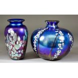 A Siddy Langley Iridescent Glass Vase and an Okra Iridescent Glass Vase, the Langley vase of bulbous