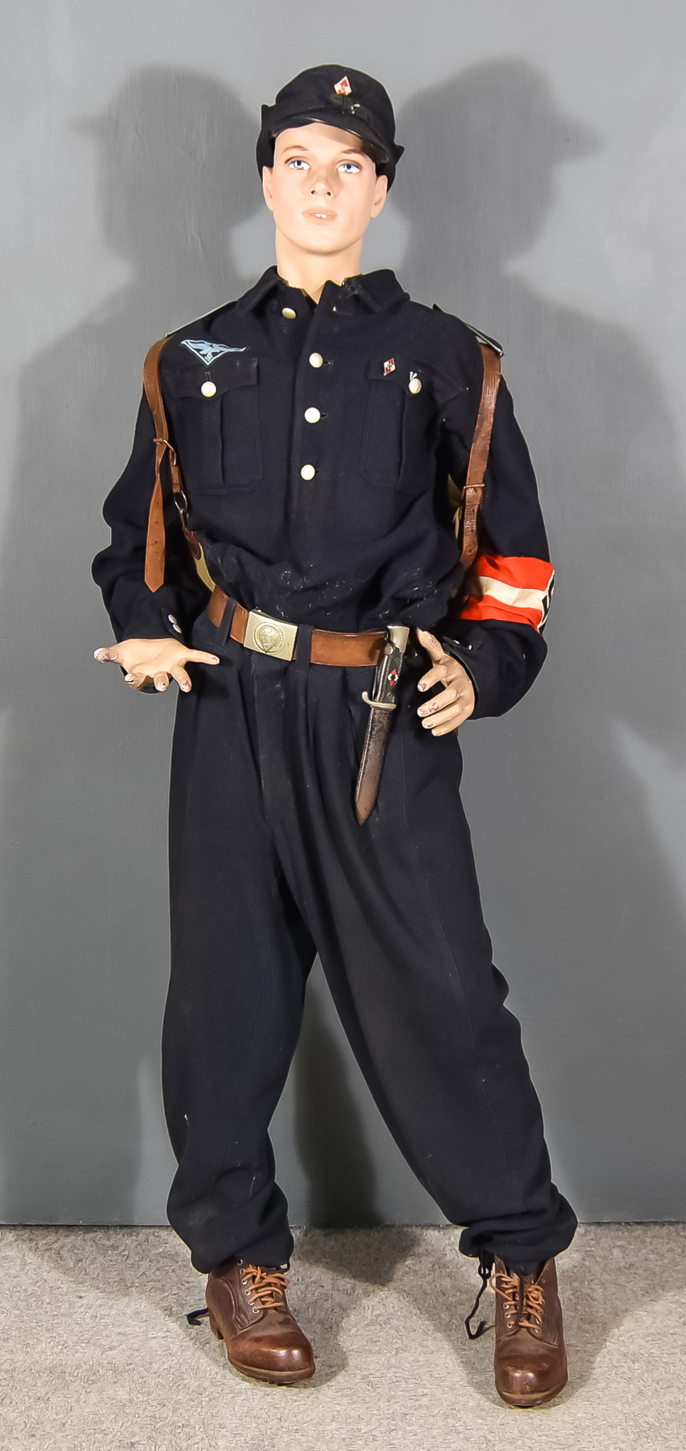 A Rare and Unusual Mannequin Dressed in Hitler Youth Uniform, 65ins high, including cap marked to