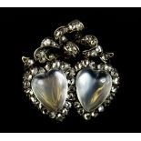 A Diamond and Moonstone Pendant or Brooch, 19th Century, set with two central moonstone hearts, each