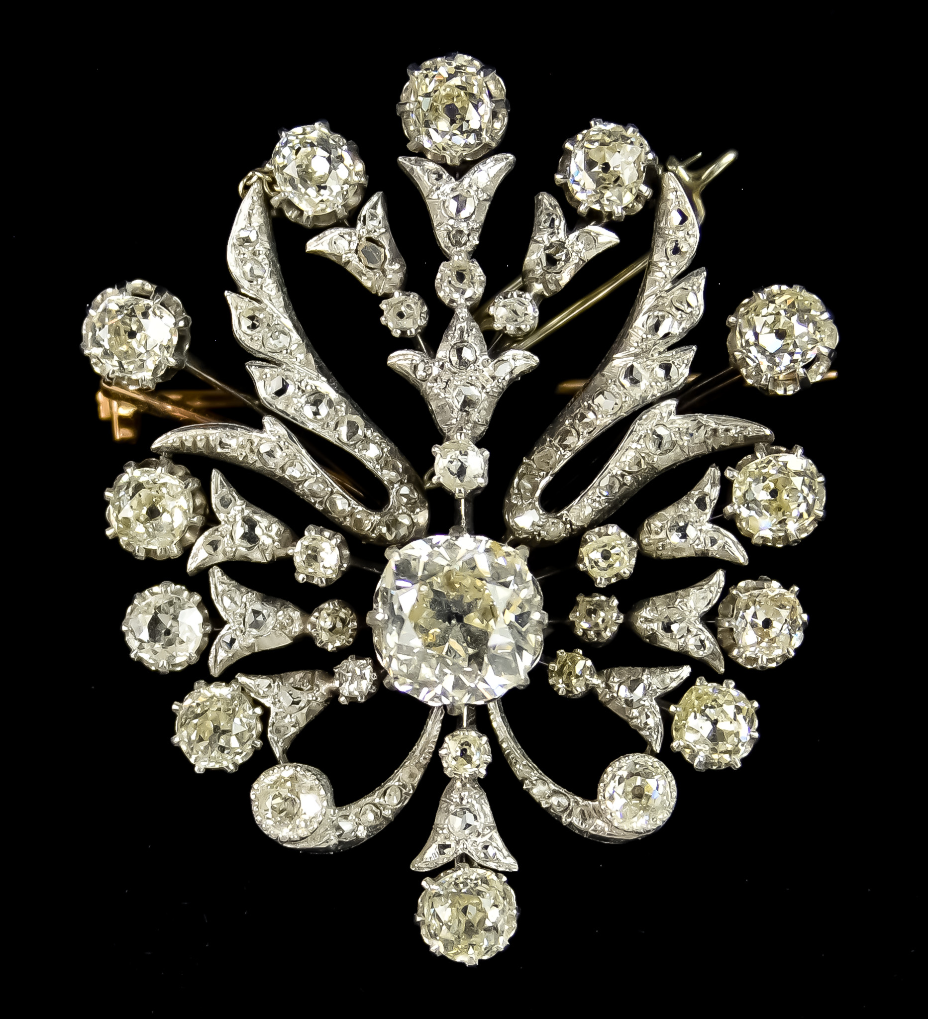 A Diamond Brooch, Late 19th/Early 20th Century, set with a centre old European cut diamond,