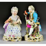 A Pair of Meissen Porcelain Figures, Late 19th Century, of a lady and gentleman seated in chairs,