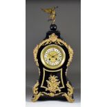 A 19th Century French Ebonised and Gilt Metal Mounted Mantel Clock of 18th Century Design the 4.5ins