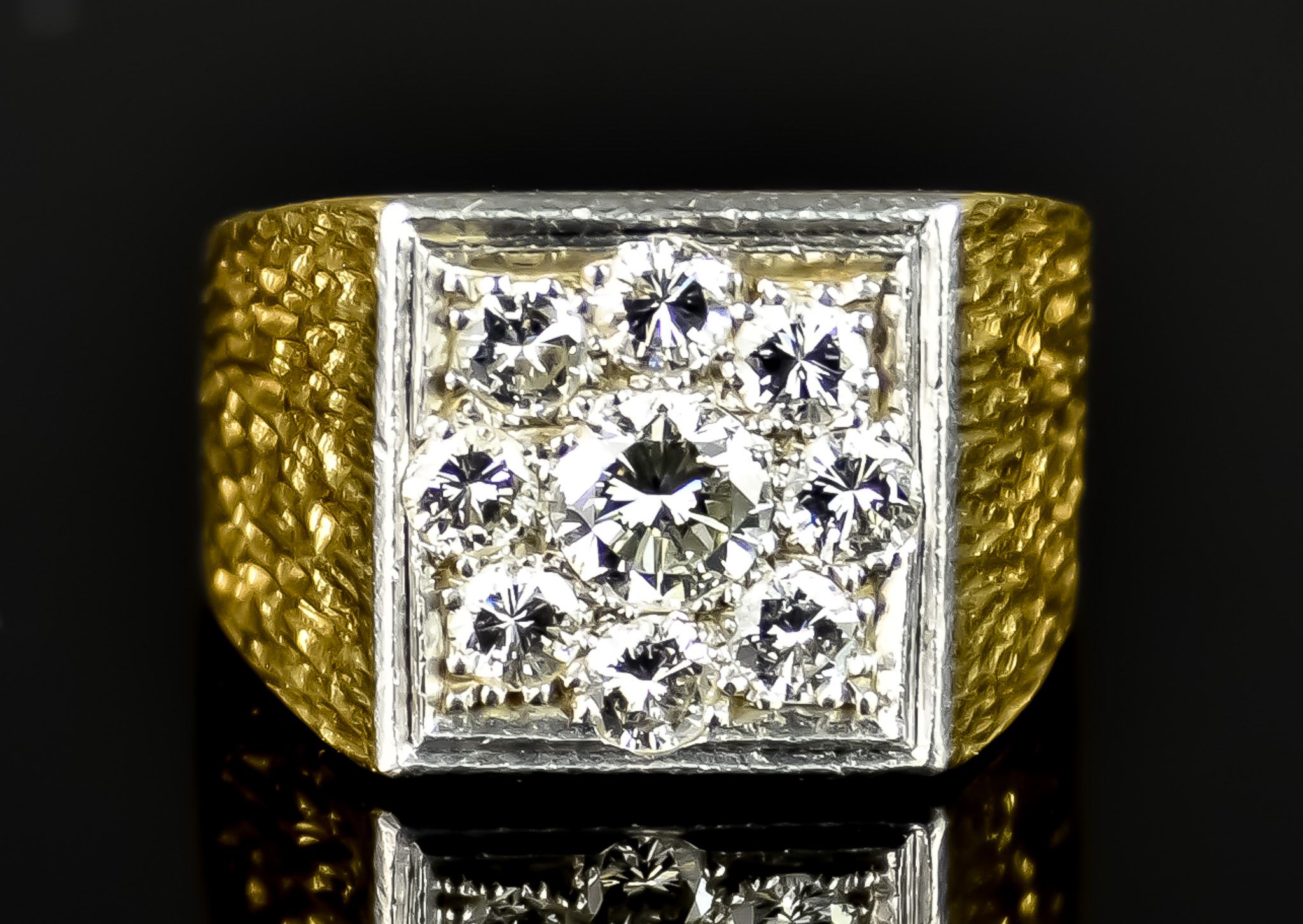 A Gentleman's 18ct Gold Diamond Set Ring, 20th Century, set with a centre brilliant cut white