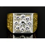 A Gentleman's 18ct Gold Diamond Set Ring, 20th Century, set with a centre brilliant cut white