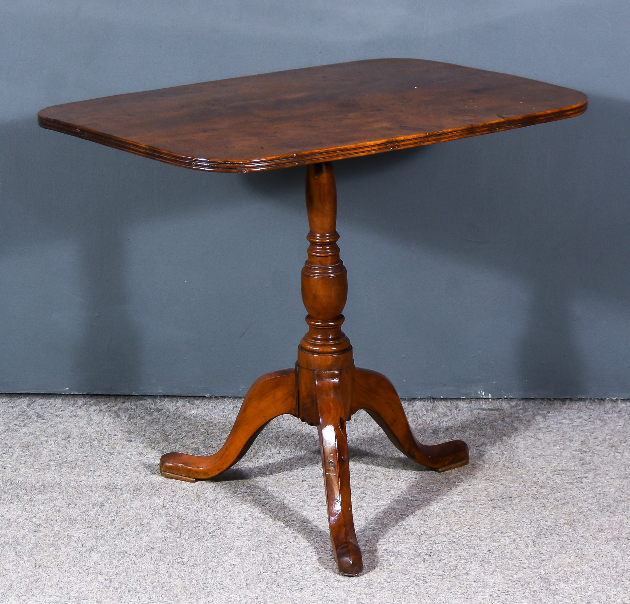 A George III Yew Wood Rectangular Tripod Occasional Table, with reeded edge to top, on baluster