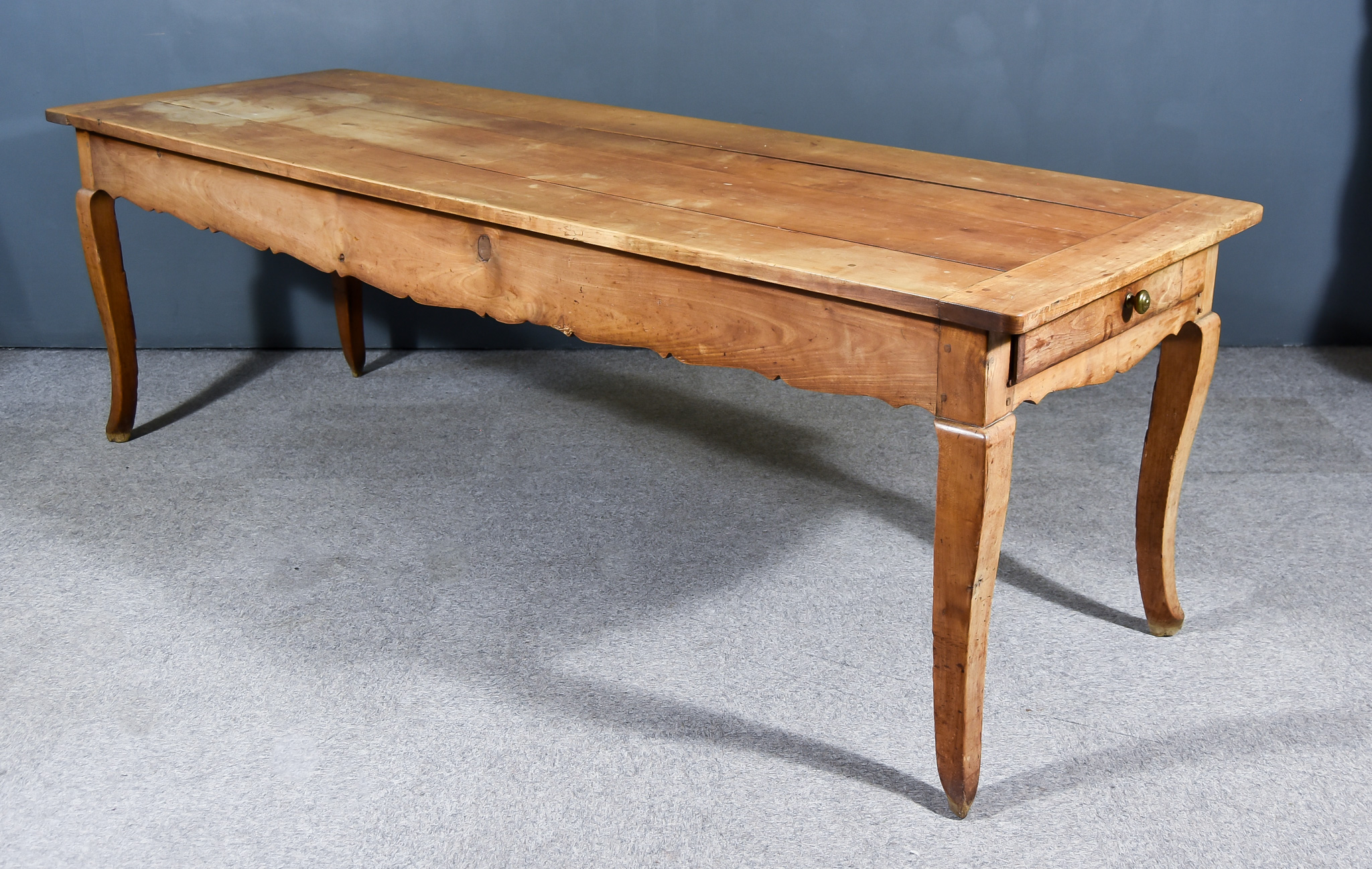 A 19th Century French Fruitwood (Cherry) Farmhouse Kitchen Table, with plain four plank top,