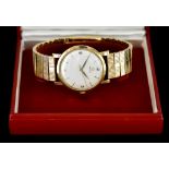 A Gentleman's Manual Wind Wristwatch, by Omega, 9ct gold case, 34mm diameter, white dial with Arabic