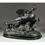A French Bronzed Metal Figure of a Pheasant, Late 19th /Early 20th Century, on oval naturalistic