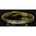 An 18ct Gold and Diamond Bracelet, Modern, three bar bracelet set with brilliant cut white diamonds,