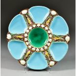 A Minton Majolica Six Division Oyster Dish, 1870, enamelled in colours and modelled with conch and