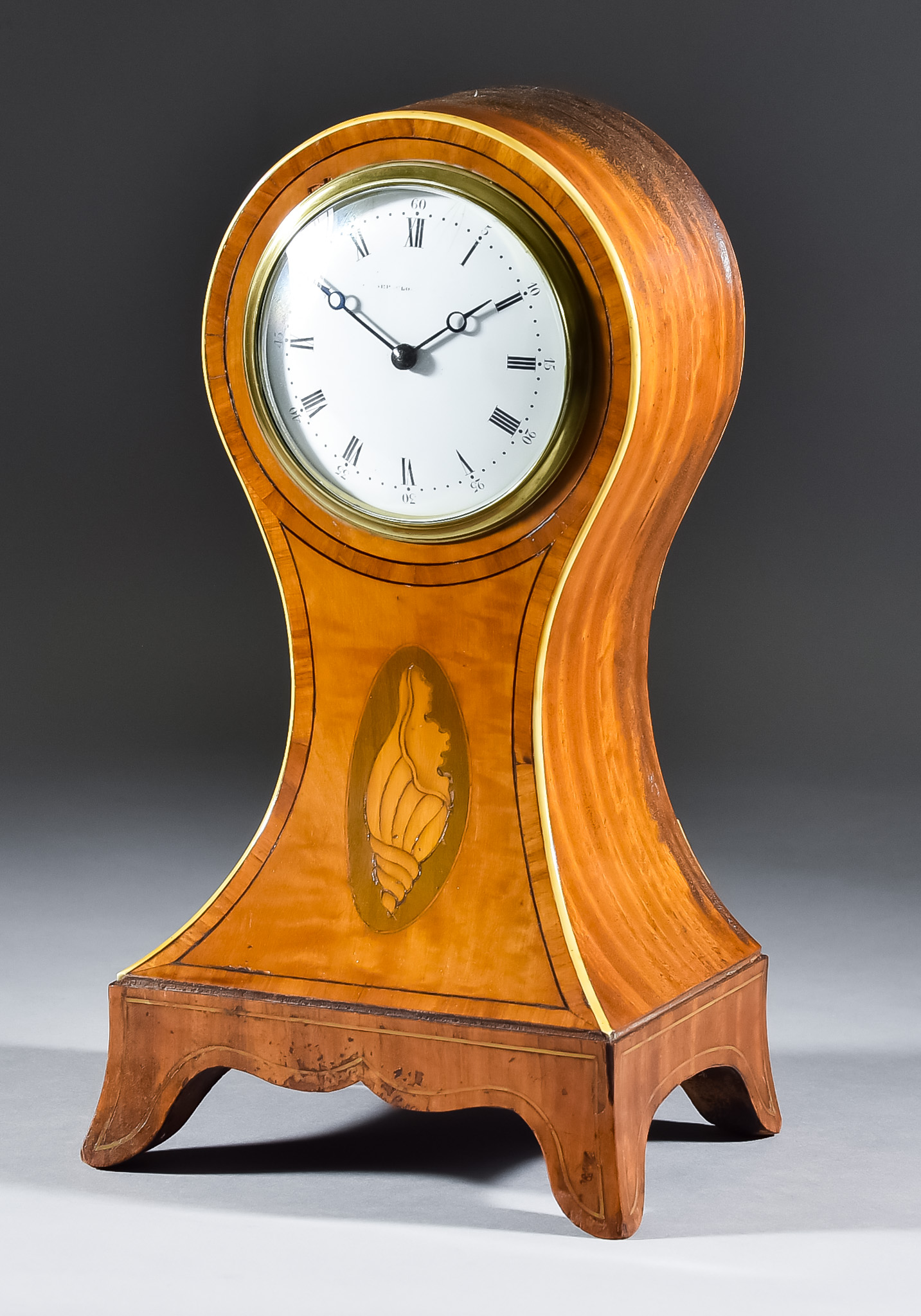 An Edwardian Satinwood Balloon Cased Mantel Timepiece the 3.5ins enamel dial with Roman and Arabic