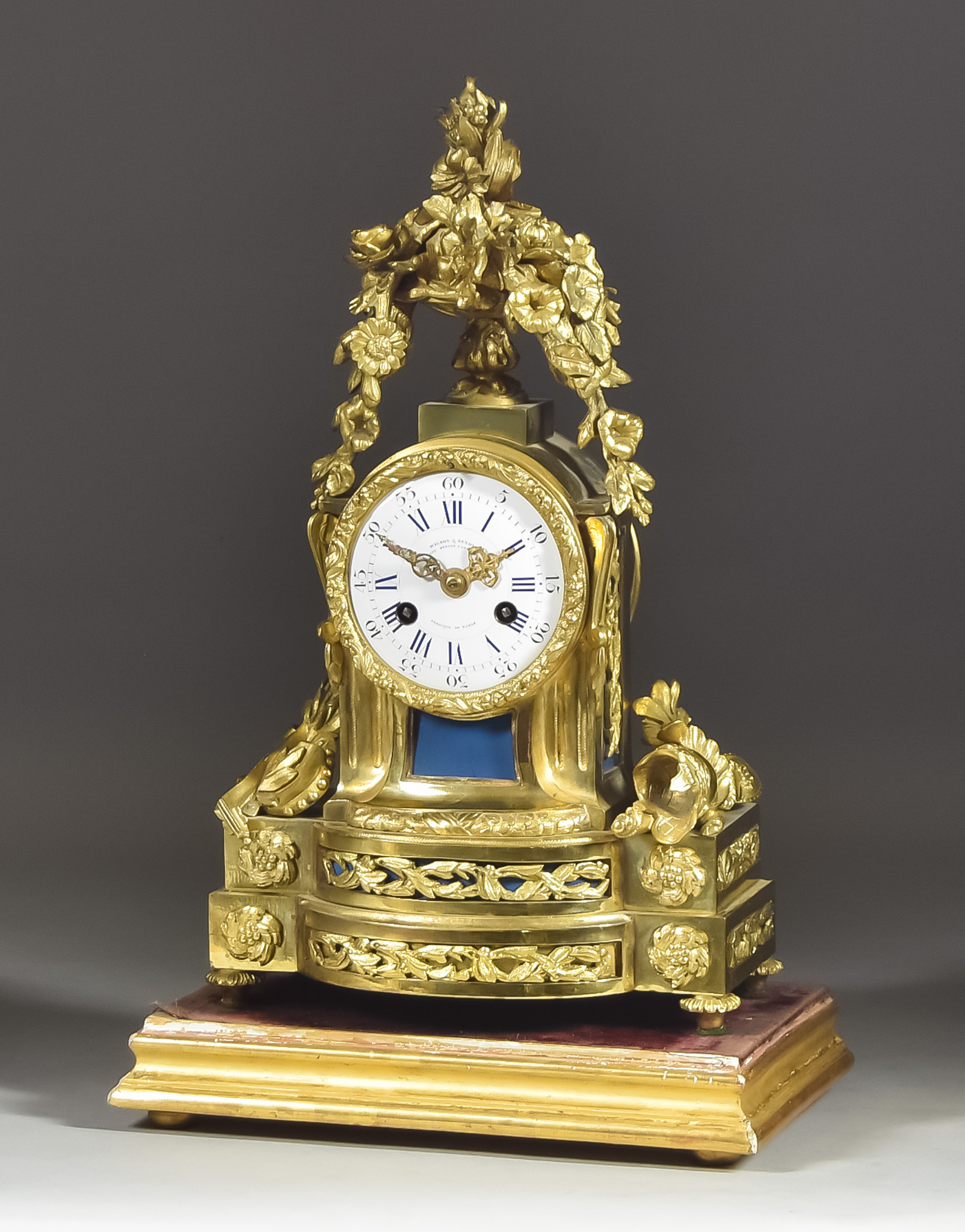 A 19th Century French Gilt Brass Mantel Clock by S.F & J.D. and retailed by Wilson and Gandar 392