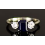 An 18ct White Gold Three Stone Sapphire and Diamond Ring, 20th Century, set with a centre faceted
