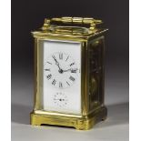 A Late 19th Century French Carriage Clock retailed by Boxell of Brighton, the white enamel dial with