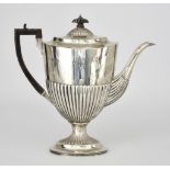 A Victorian Silver Oval Coffee Pot by Charles Stuart Harris, London 1886, with part reeded body,