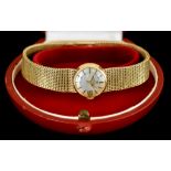 A Lady's Manual Wind Wristwatch, by Omega, 9ct gold case, 20mm, silver dial with gold baton numerals