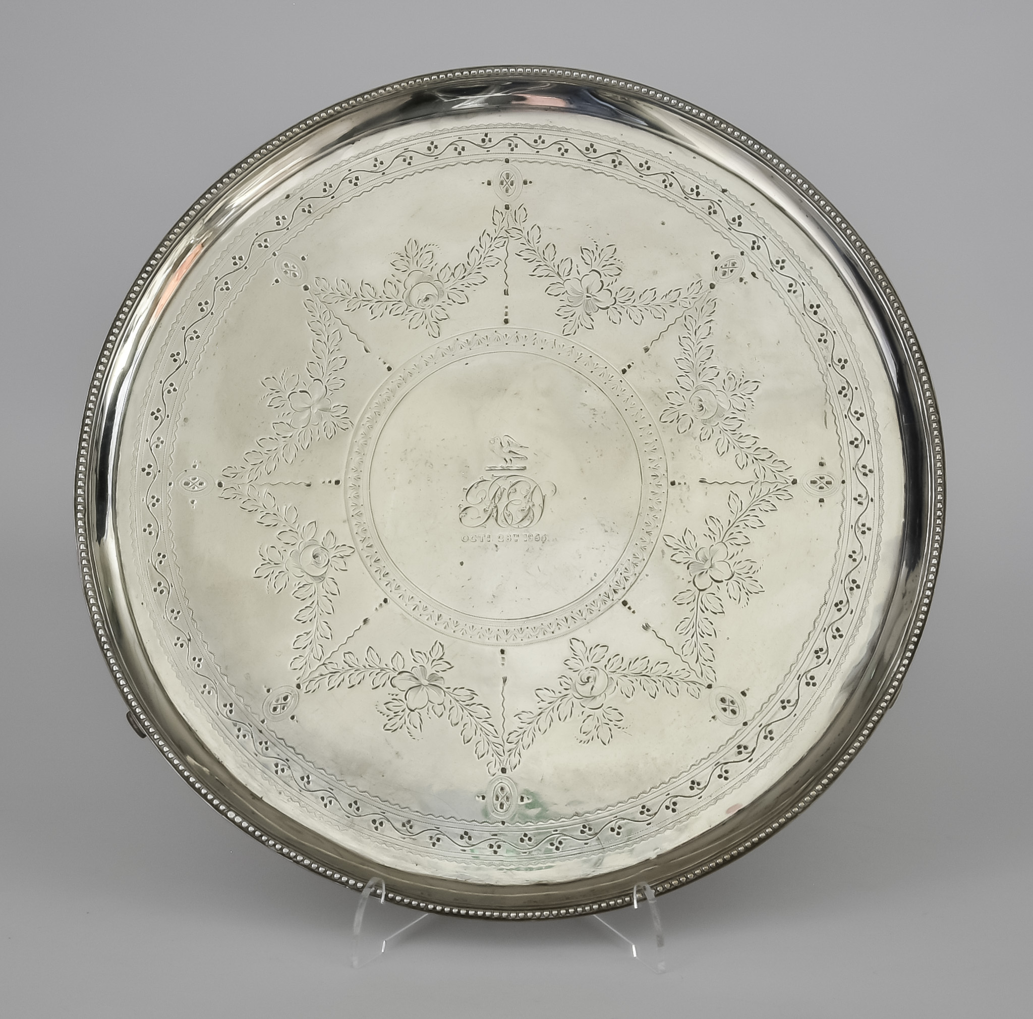 A George III Silver Circular Salver by Richard Rugg II, London 1781, with bead mounts, engraved with