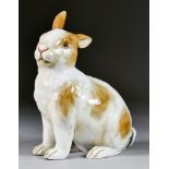 A Meissen Porcelain Model of a Rabbit, 19th Century, with brown patch decoration, 7ins high with