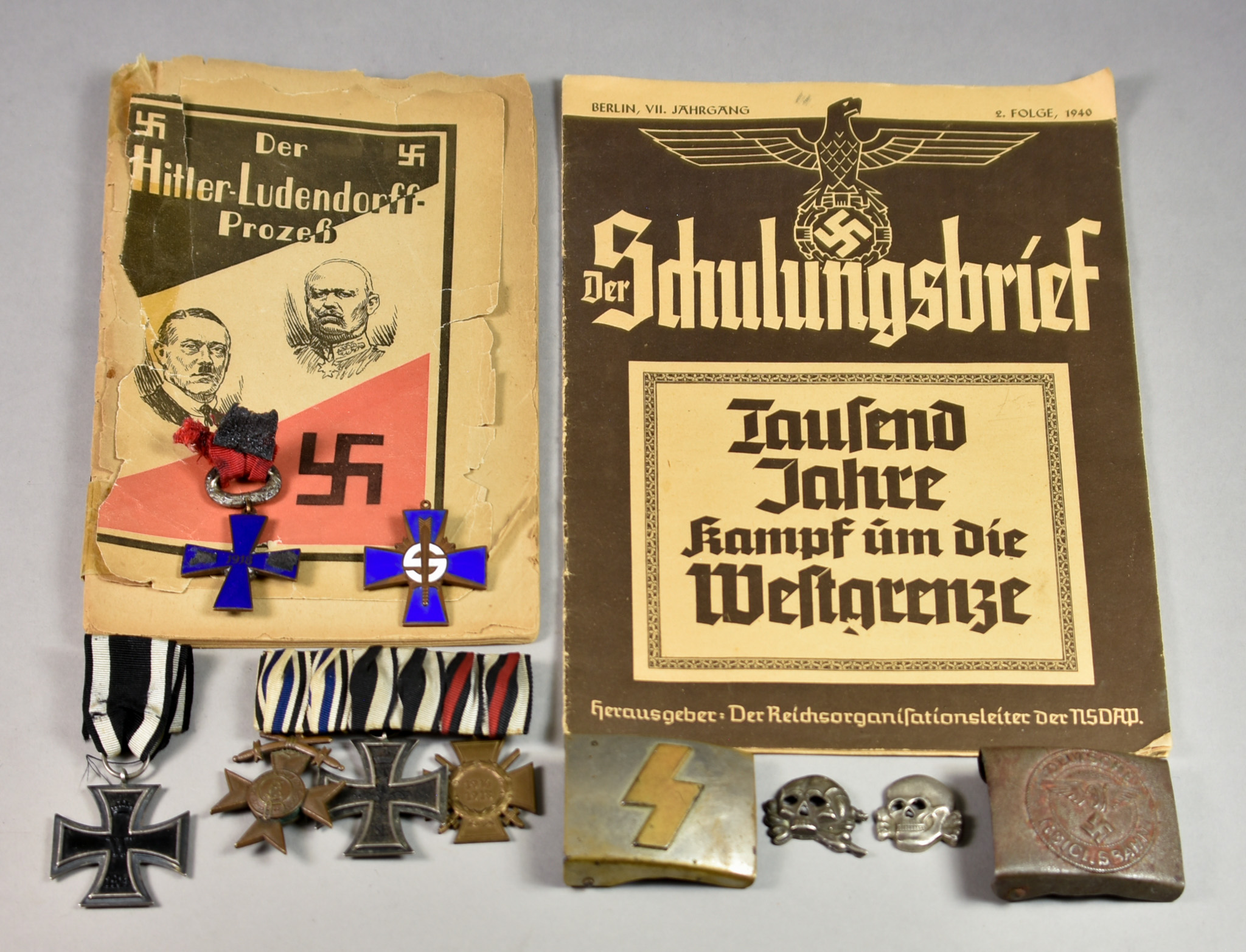 Four German Medals, comprising - two German Iron Crosses, Military Merit Cross (Bavaria), and a