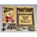 Four German Medals, comprising - two German Iron Crosses, Military Merit Cross (Bavaria), and a