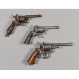 Three Continental Pin Fire Pistols, 19th Century, calibre various, condition various