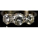 An 18ct Gold Three Stone Diamond Ring, 20th Century, set with three brilliant cut white diamonds,