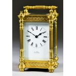 An Early 20th Century Brass Carriage Timepiece, retailed by W. Ray of Southampton, the white